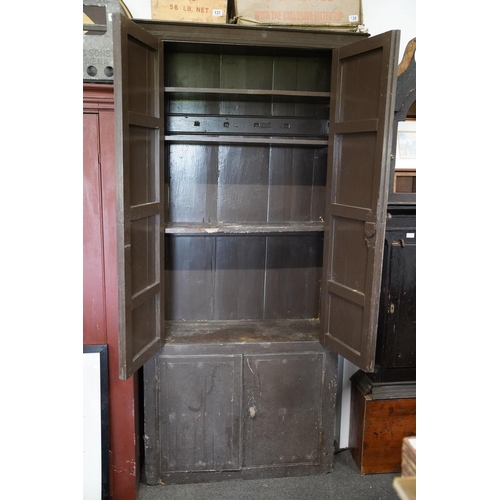 129 - A stunning antique Irish four door housekeepers cupboard, measuring 102x211x38cm.