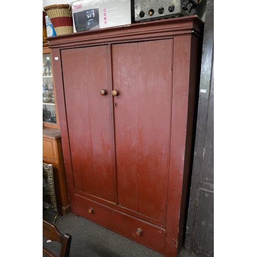 136 - A stunning antique Irish two wardrobe with drawer base, measuring 128x184x51cm.