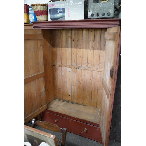 136 - A stunning antique Irish two wardrobe with drawer base, measuring 128x184x51cm.