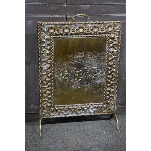 141 - A vintage brass firescreen, measuring 46x68cm.