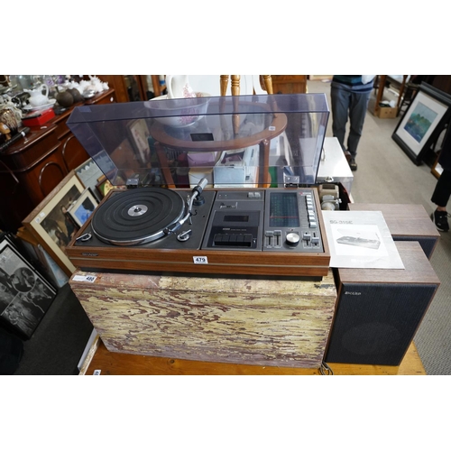 479 - A stunning vintage Sharp SG 315E record player, two speakers and instruction booklet.