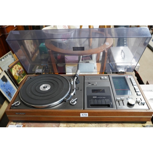 479 - A stunning vintage Sharp SG 315E record player, two speakers and instruction booklet.