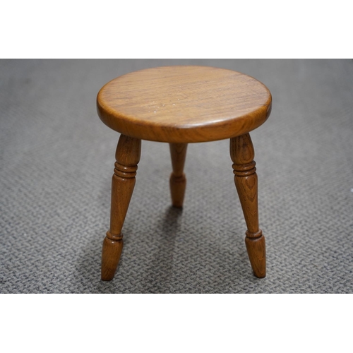 488 - A pine milking stool.