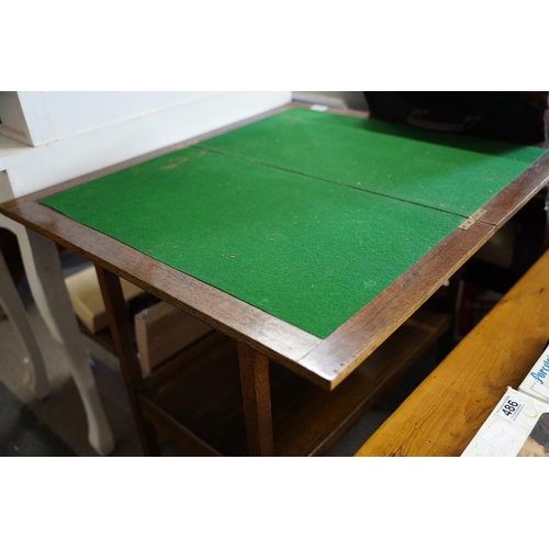 491 - A vintage oak/card table, measuring 80x73x80cm.