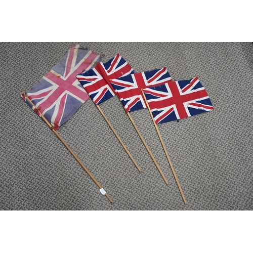 493 - Three vintage British made union jack flags and another.