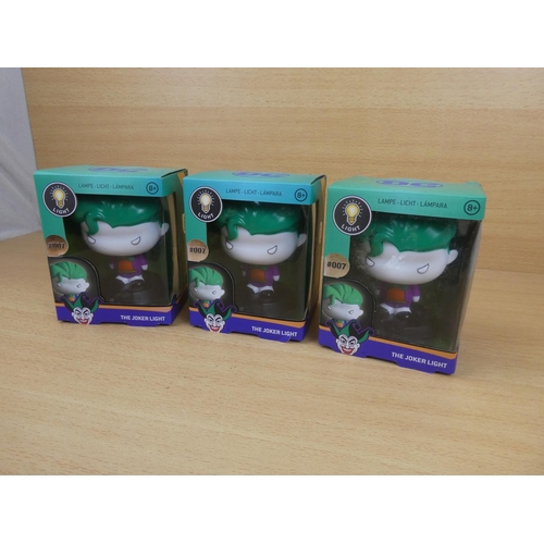 501 - Three boxed DC Joker lights.