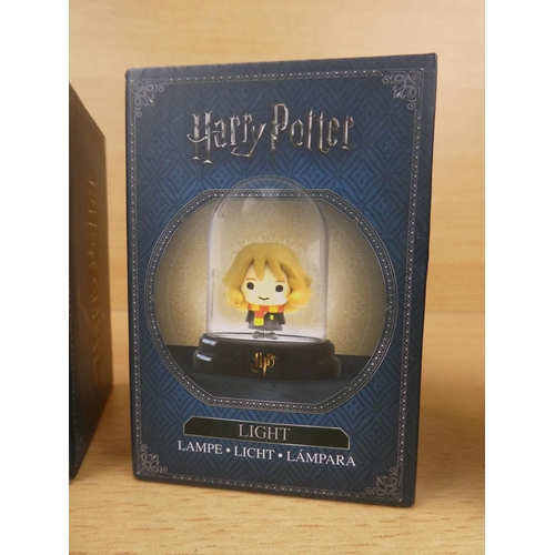 506 - Four boxed Harry Potter character lights.