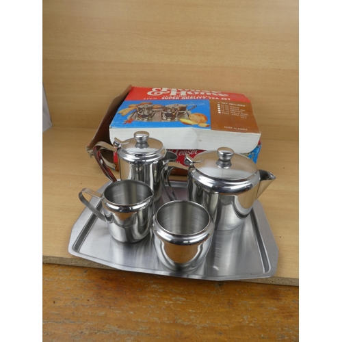 508 - A vintage boxed House & Home stainless tea set.