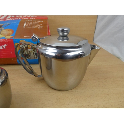 508 - A vintage boxed House & Home stainless tea set.