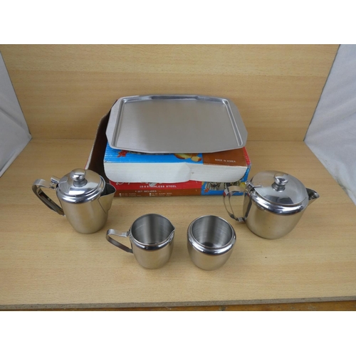 508 - A vintage boxed House & Home stainless tea set.