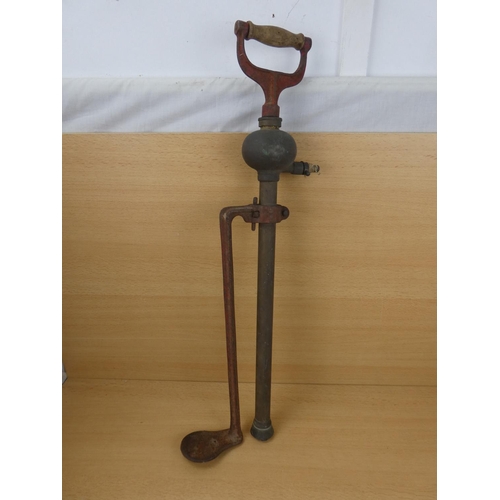 513 - An antique Prima foot pump.