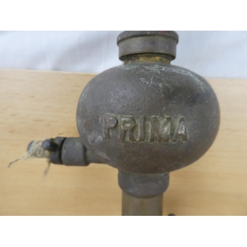 513 - An antique Prima foot pump.