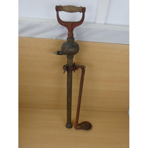 513 - An antique Prima foot pump.