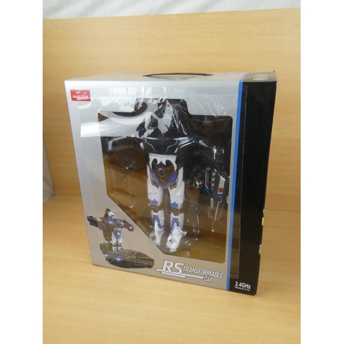 516 - A boxed Rastar RS Transformer car, scale 1:14.