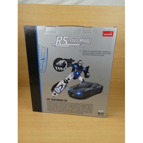 516 - A boxed Rastar RS Transformer car, scale 1:14.