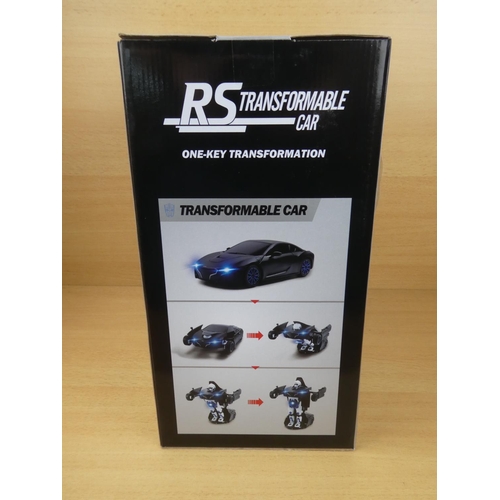 516 - A boxed Rastar RS Transformer car, scale 1:14.