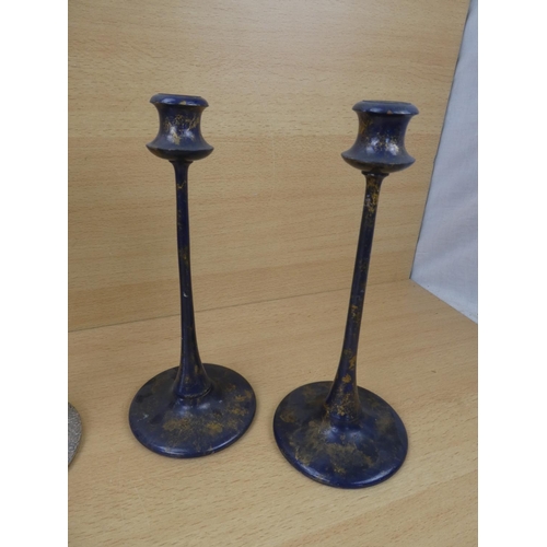 523 - A pair of metal and wood turned candlesticks and another pair.