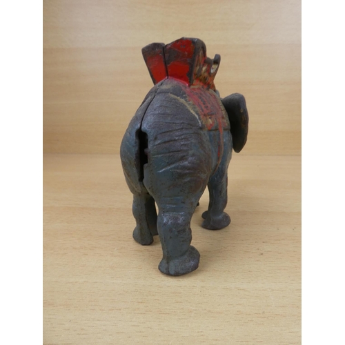 529 - A stunning antique cast iron mechanical money box, modelled as an elephant.