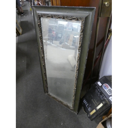 533 - A decorative framed wall mirror, measuring 50x104cm.