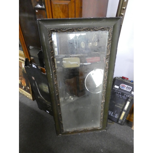 533 - A decorative framed wall mirror, measuring 50x104cm.