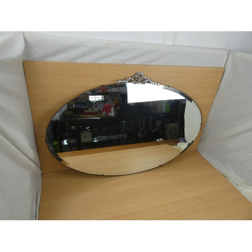 546 - A stunning vintage frameless mirror, measuring 49x76cm.