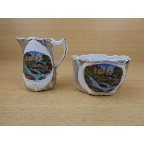 558 - A vintage souvenir jug and bowl 'Dog Leap, Limavady'.