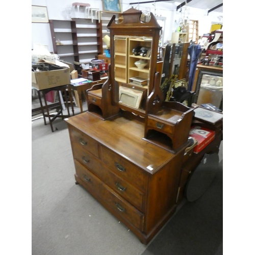 559 - An antique mahogany dressing table with walnut panels, measuring 107x170x49cm.