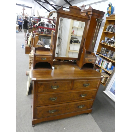 559 - An antique mahogany dressing table with walnut panels, measuring 107x170x49cm.