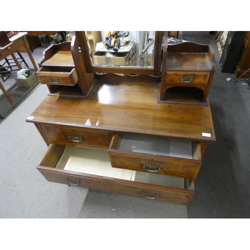 559 - An antique mahogany dressing table with walnut panels, measuring 107x170x49cm.