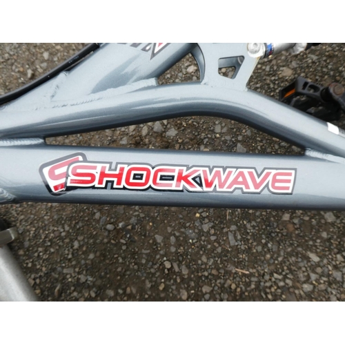 566 - A XT Dynamics Shockwave bike.