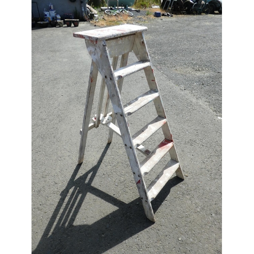 593 - A vintage wooden step-ladder.