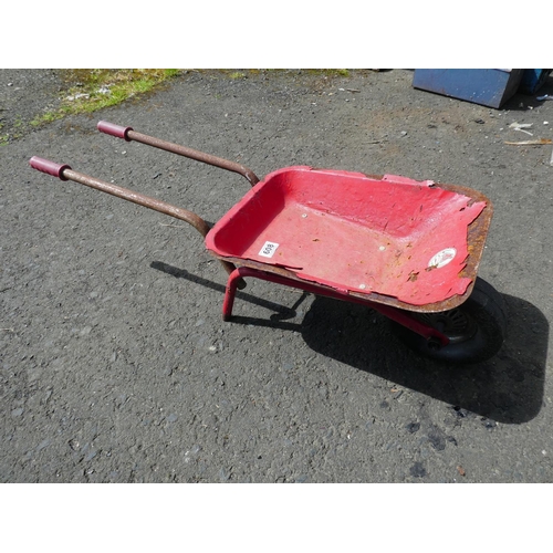 608 - A vintage children's wheelbarrow, made in Japan.