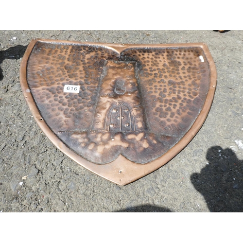 616 - A stunning copper plaque / shield with decorative hammering.