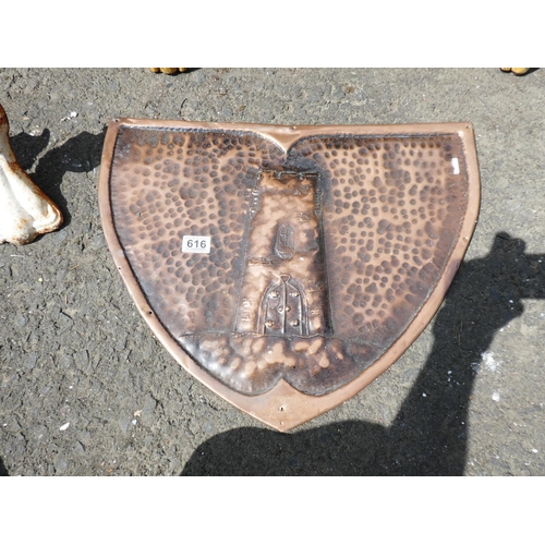 616 - A stunning copper plaque / shield with decorative hammering.