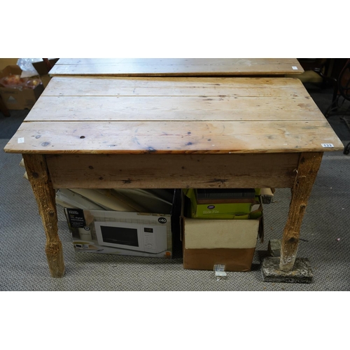 133 - An Irish vernacular pine table, in need of extensive restoration.