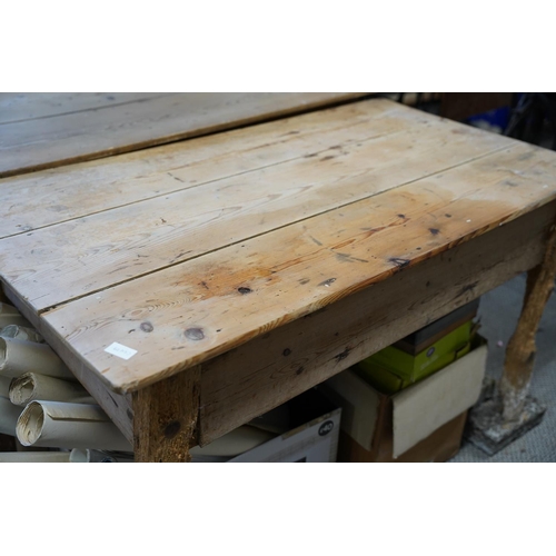 133 - An Irish vernacular pine table, in need of extensive restoration.