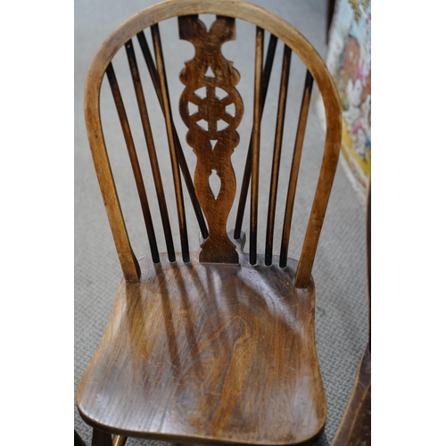 36 - A set of 4 vintage chairs with decorative back splats.