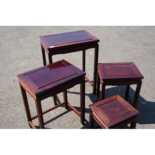 6 - A stunning nest of four Oriental style tables, shipped from Hong Kong.