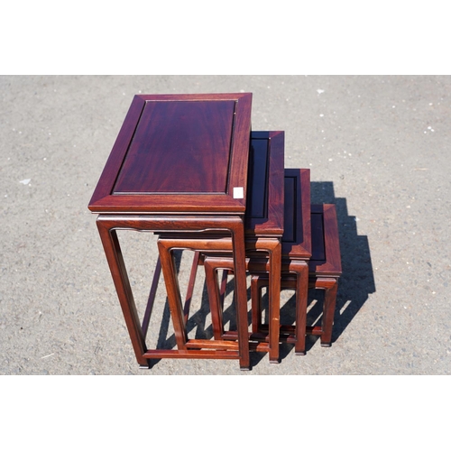 6 - A stunning nest of four Oriental style tables, shipped from Hong Kong.