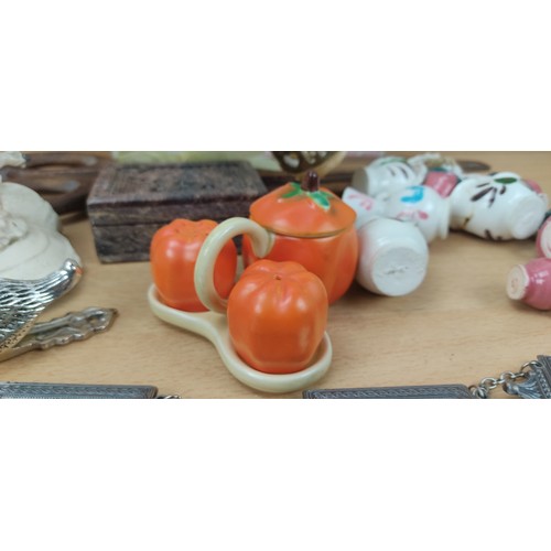 4 - A large assortment of items to include, an anniversary egg, a cruet set, a soap stone trinket box an... 