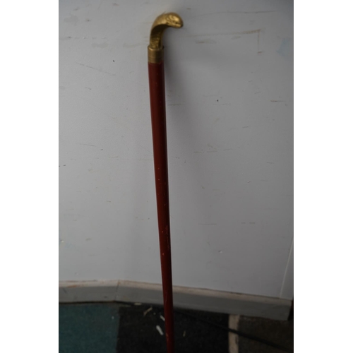 84 - A brass snake head walking stick.