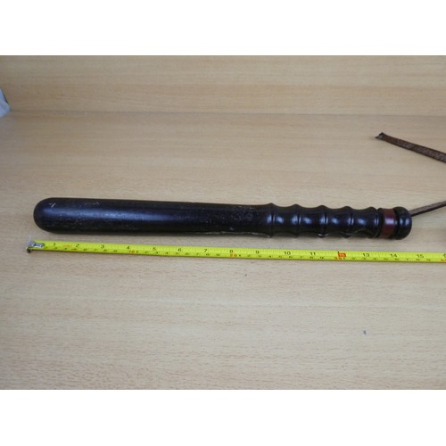 106 - A vintage wooden police truncheon.