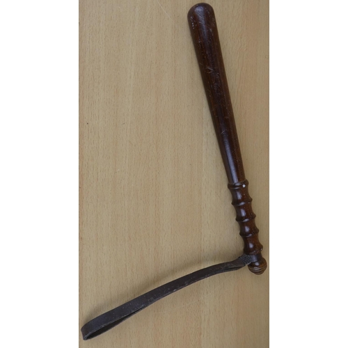 10 - A vintage wooden police truncheon.