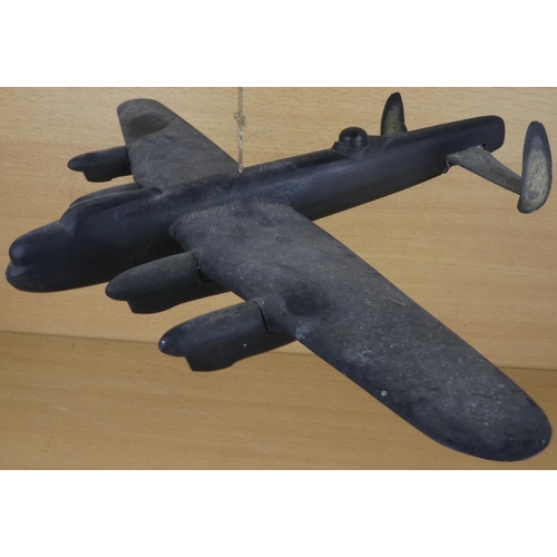 12 - A vintage handmade wooden 'Lancaster' model aeroplane.