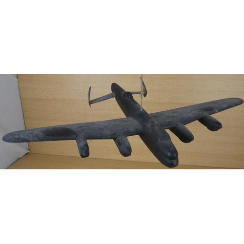 12 - A vintage handmade wooden 'Lancaster' model aeroplane.