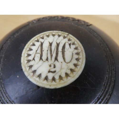 14 - Two antique wooden carpet bowls.