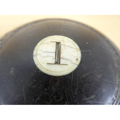 14 - Two antique wooden carpet bowls.