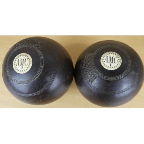 14 - Two antique wooden carpet bowls.