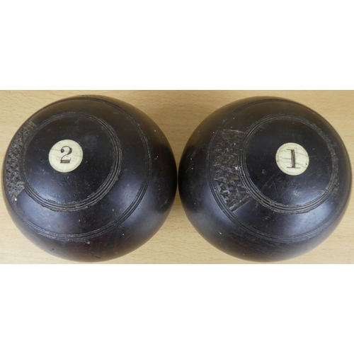 14 - Two antique wooden carpet bowls.