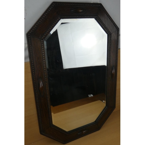 2 - A vintage oak framed wall mirror.